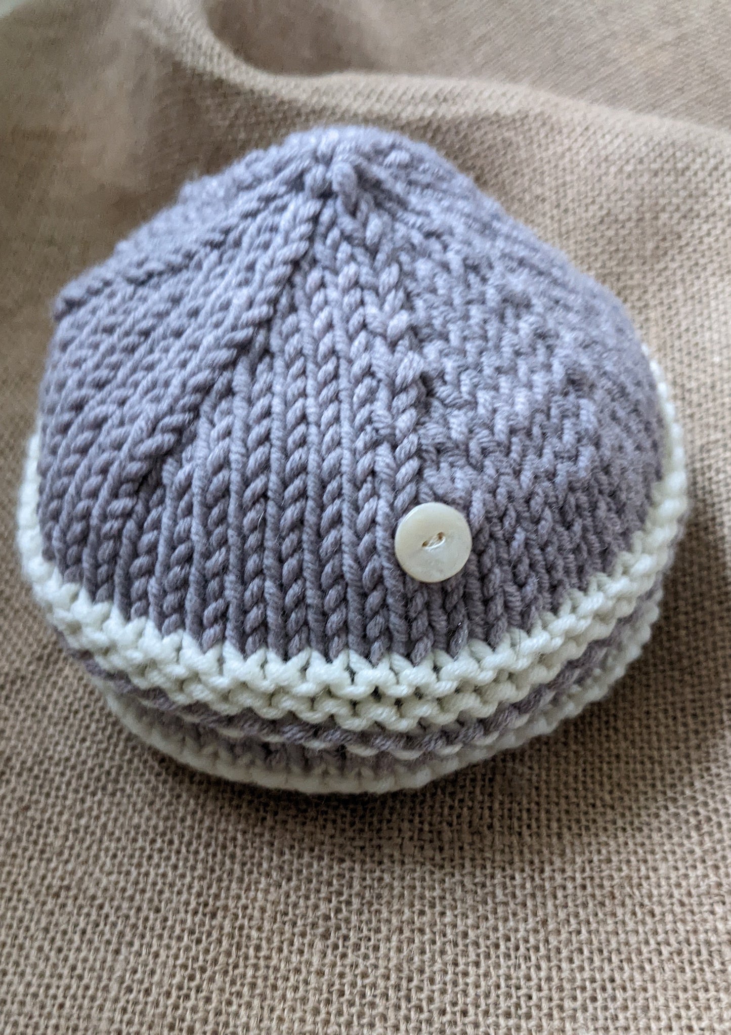 Hand knitted baby hat in merino wool