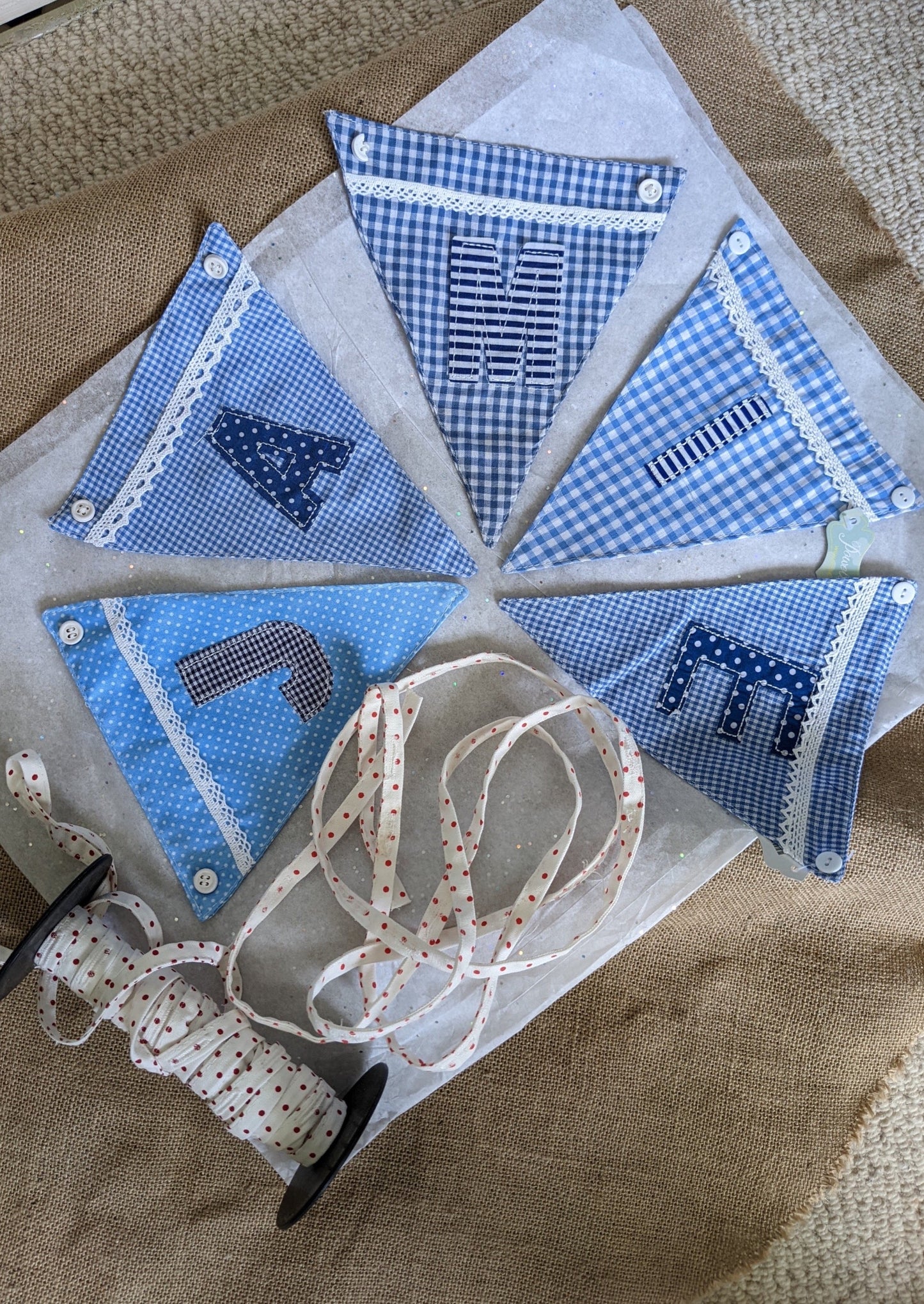 Blue fabric bunting letters
